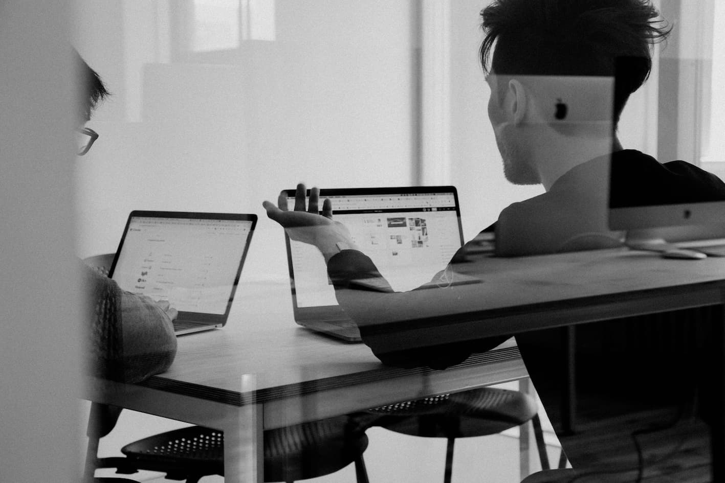 Professional workspace with multiple monitors